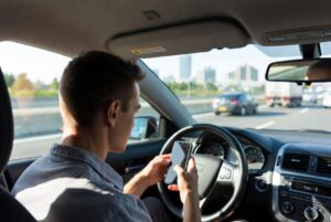 Distracted driver on a cell phone