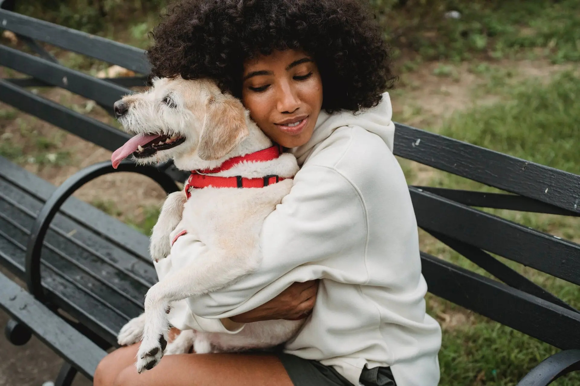 Girl hugging dog