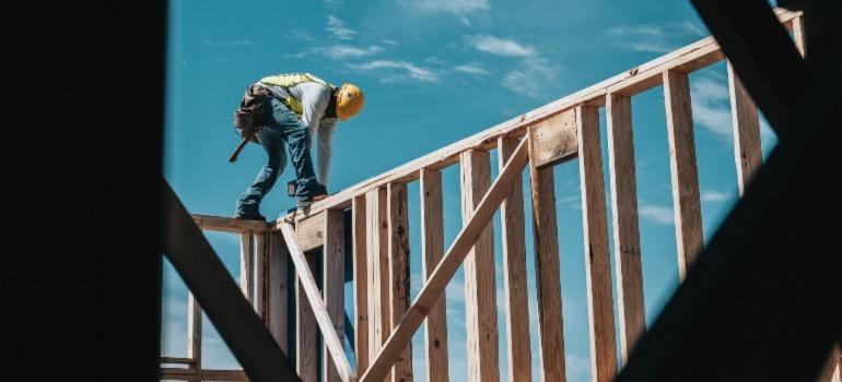 A construction worker wearing a helmet for safety